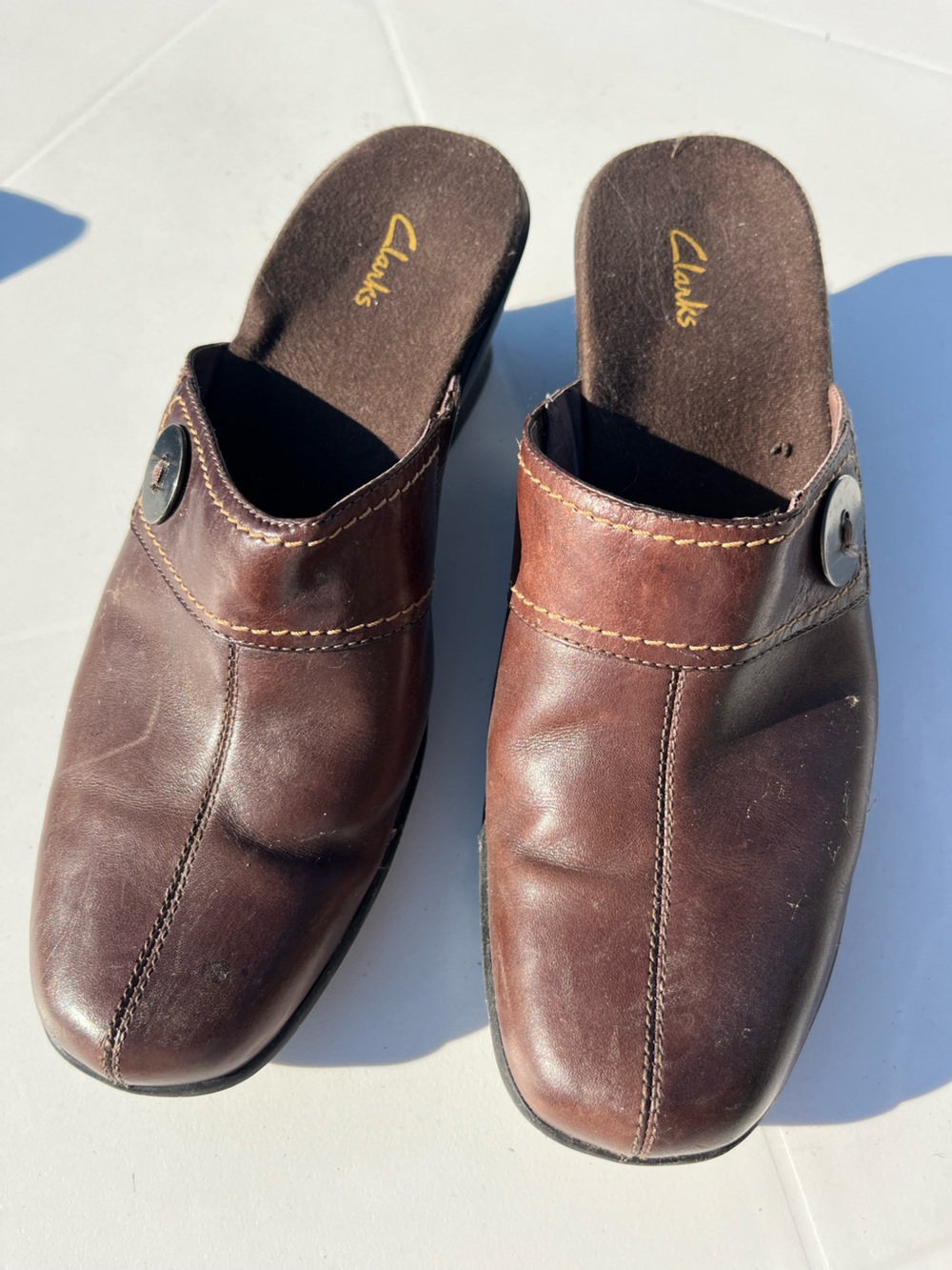 Women’s size 8.5 brown slip on Clark’s shoes